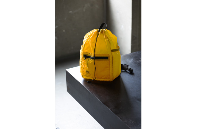 KT_3259272426_AIRY KINCHAKU DAYPACK_Yellow_1.jpg